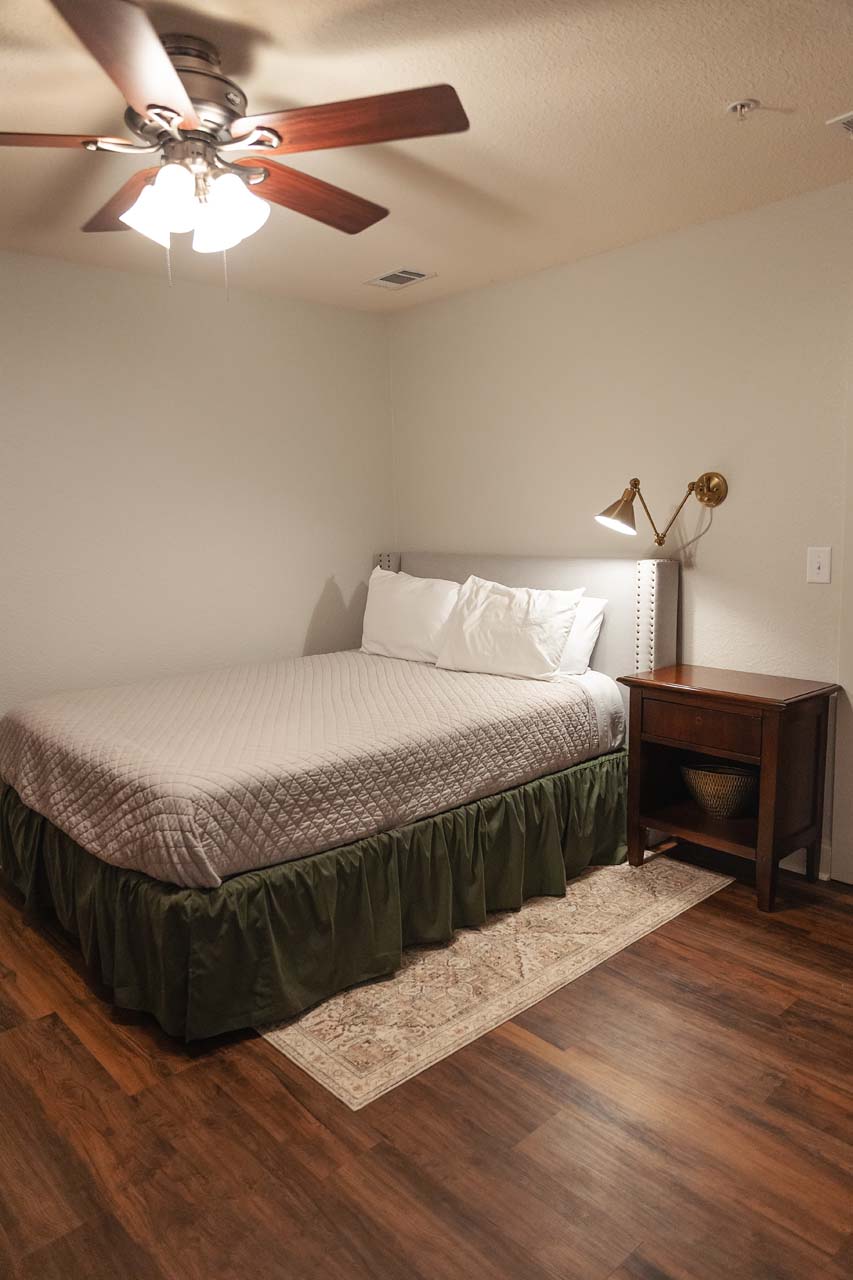 Guest bedroom with a ceiling fan
